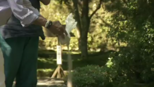 Jerry lays the ashes of his wife Helene into the river at a temple in Japan.