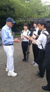 Captain Jerry Yellin speaking with Japanese students about war and peace